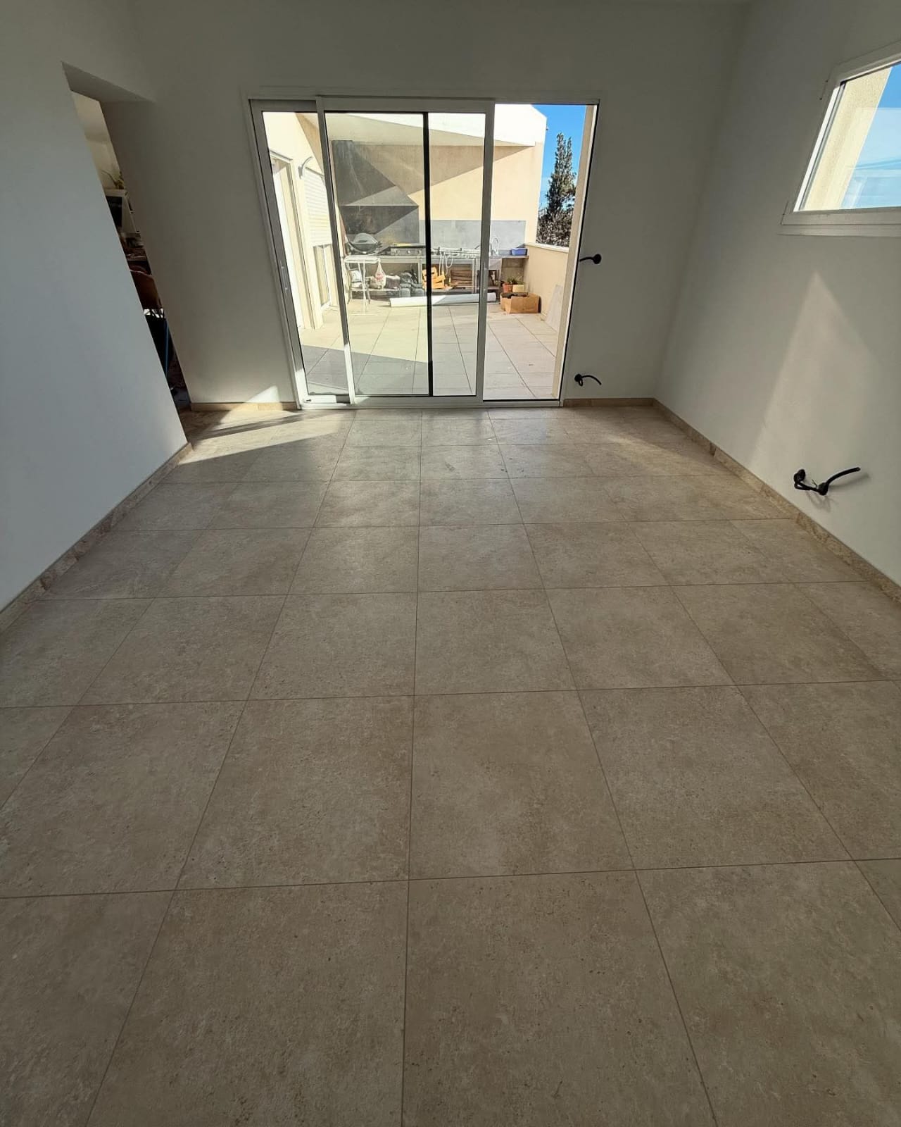 Pose carrelage - Maison Extension